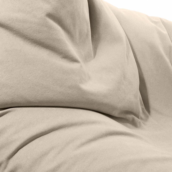 Pouf Shongo medio a forma di triangolo in tessuto antimacchia Dali per interno dim: 90x135 cm