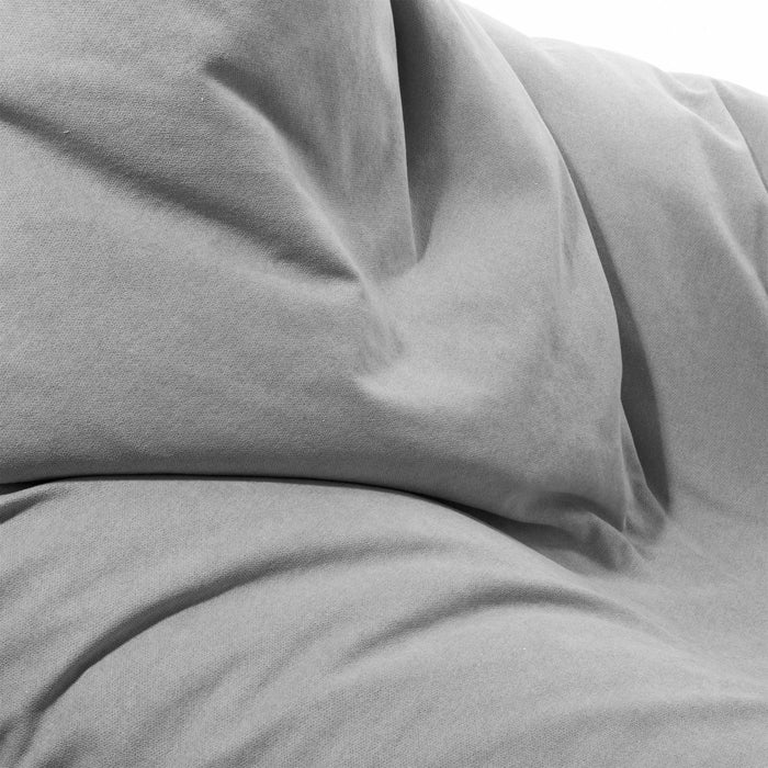Pouf Shongo medio a forma di triangolo in tessuto antimacchia Dali per interno dim: 90x135 cm
